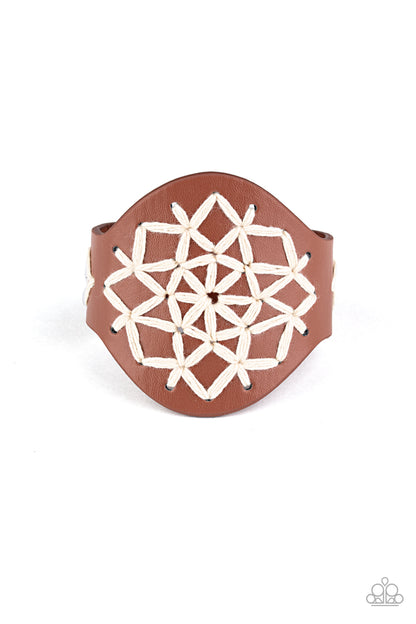 Un punto de cruz en el tiempo - Marrón